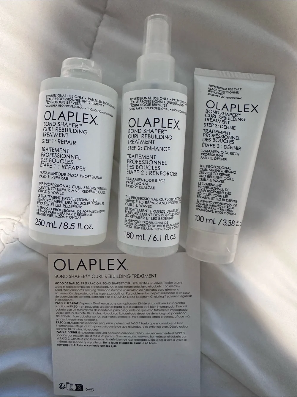 OLAPLEX Bond Shaper Curl Rebuilding Treatment – White and Blue Accents